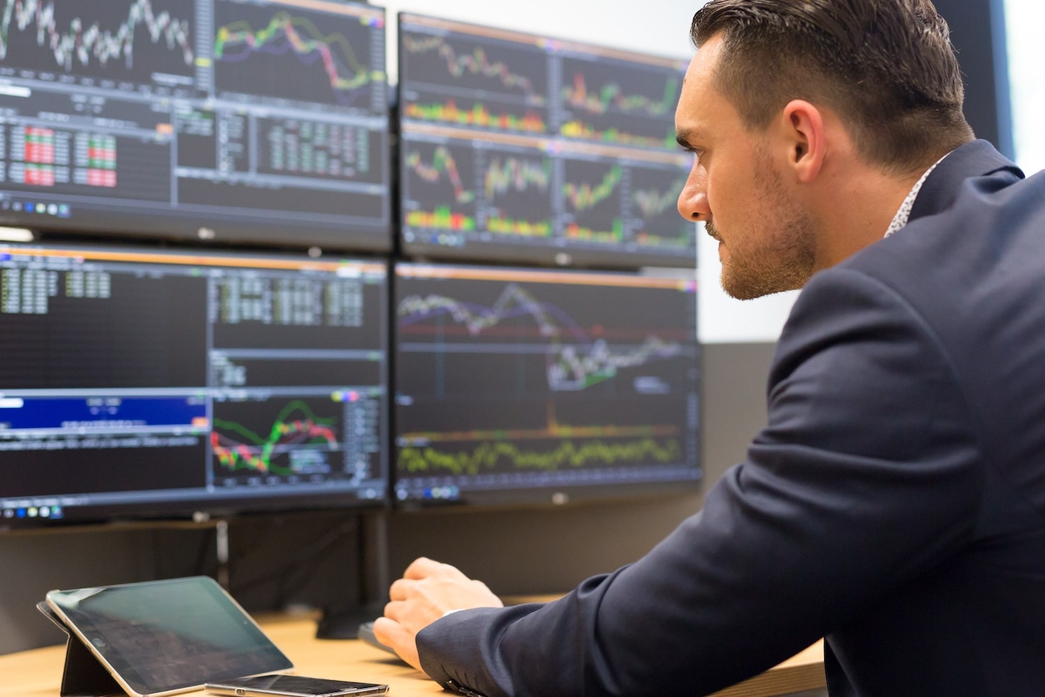 AI-focused ETFs have crossed $65 billion in assets (J.P. Morgan data, via The Daily Upside), roughly doubling since the start of last year (Shutterstock)