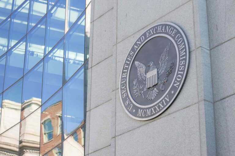 SEC officials reviewing documents at a conference table with crypto rules framework papers spread across the surface