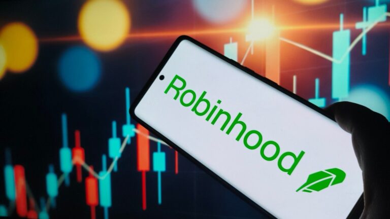 Robinhood's cryptocurrency trading platform interface displayed on a smartphone screen, showing UK crypto trading options and market data