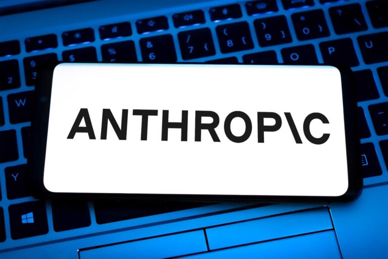 A financial analyst reviews an SEC filing for the short Anthropic ETF on a computer monitor in an