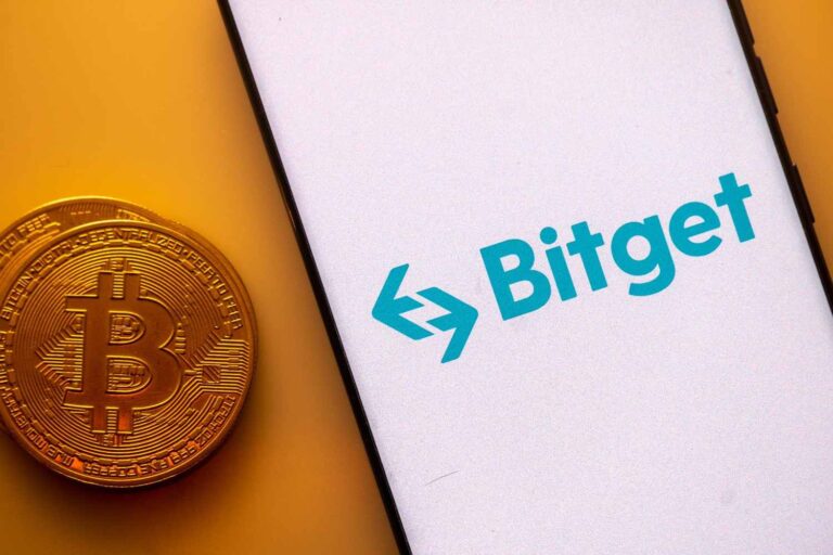 Bitget exchange app displayed on a smartphone screen against a light background