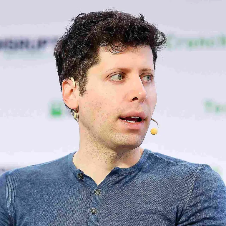 OpenAI CEO Sam Altman speaks at a conference, where he warned against treating AI models as spiritual beings