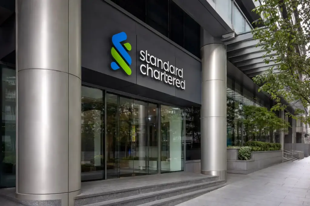 Illustration for Standard Chartered CEO Walks Back AI Jobs Remarks After Regulator Pushback