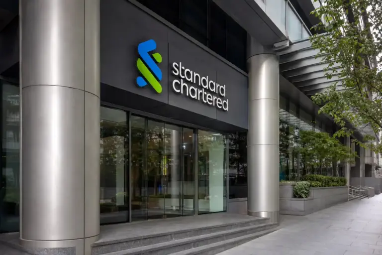 Illustration for Standard Chartered CEO Walks Back AI Jobs Remarks After Regulator Pushback
