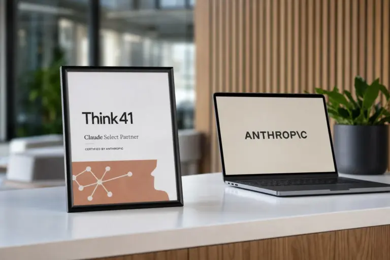 Think41 consultant working on a laptop with an Anthropic Claude dashboard after earning Select Partner status